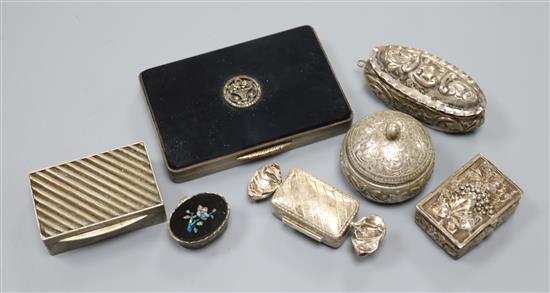 A 1920s silver, black onyx and marcasite set case, a repousse silver box and four assorted modern silver boxes.